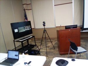 This is an image of a Hybrid Meeting setup for a PGS meeting in the Largo Library Jenkins Room